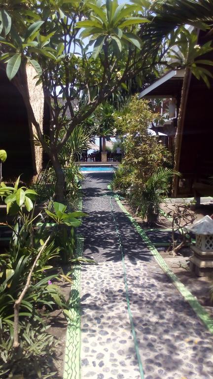 Coral Beach Pizza Cottages Gili Trawangan Exterior foto