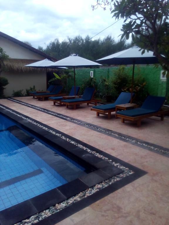 Coral Beach Pizza Cottages Gili Trawangan Exterior foto